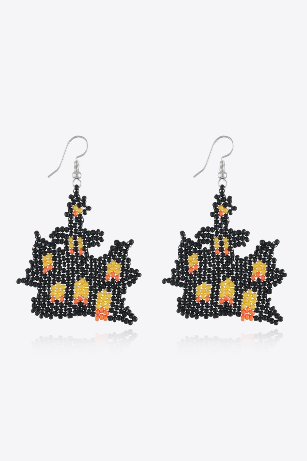A pair of black, orange, and yellow beaded Halloween-themed earrings.