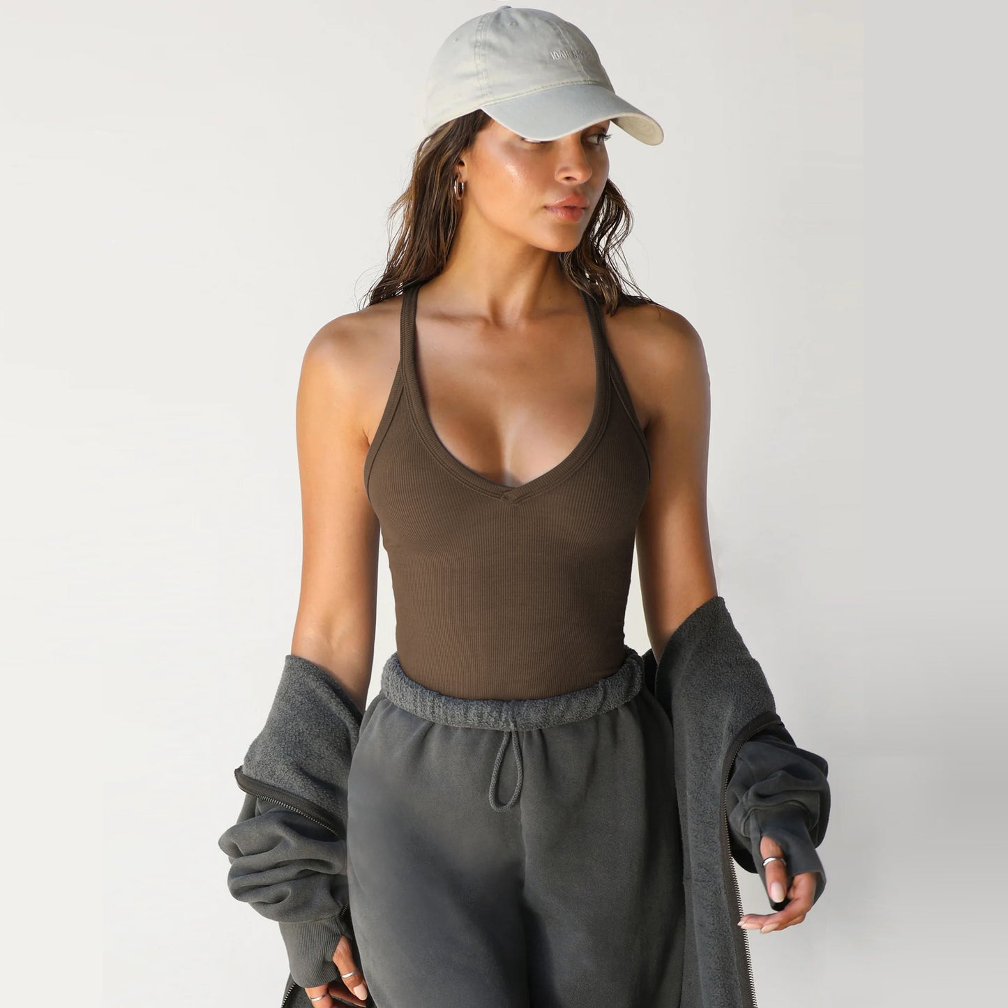 A knitted vest top is paired with a base layer