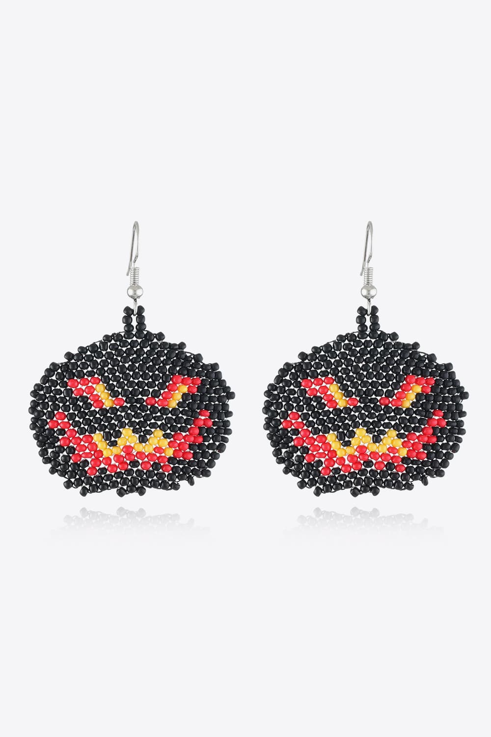 Pair of Halloween-themed beaded earrings in the shape of jack-o'-lanterns.