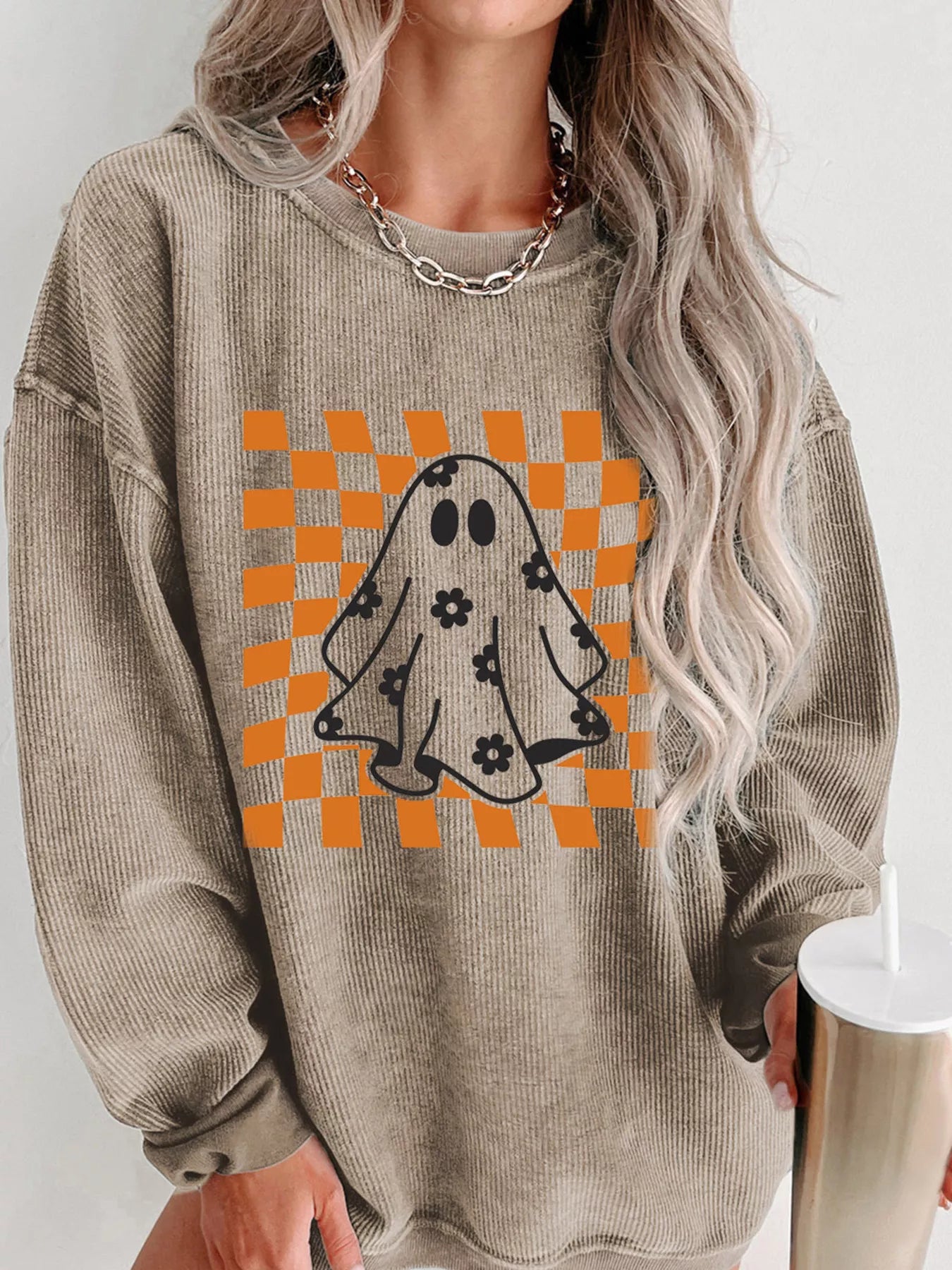 Halloween checkerboard floral ghost graphic corded sweatshirt.