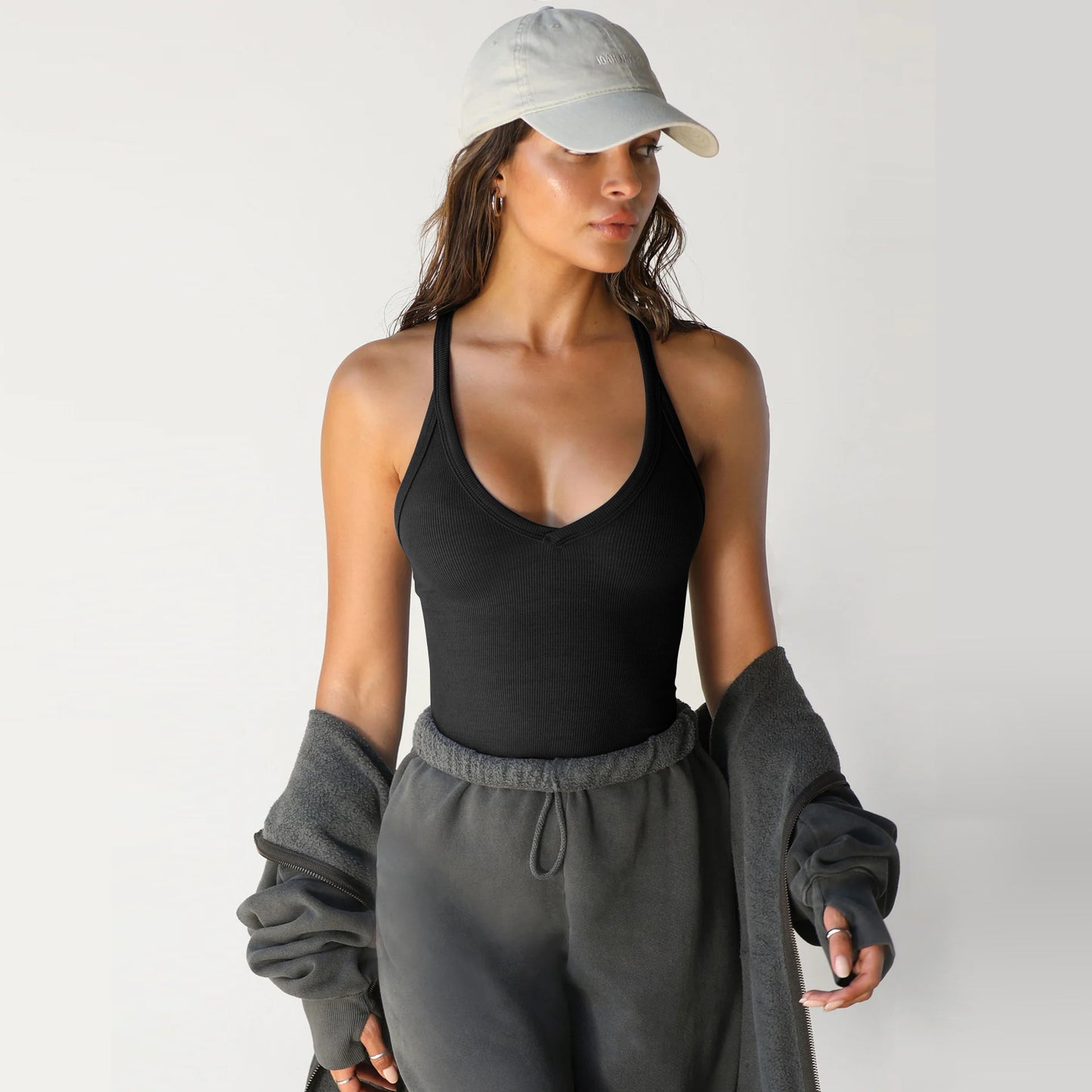 A knitted vest top is paired with a base layer