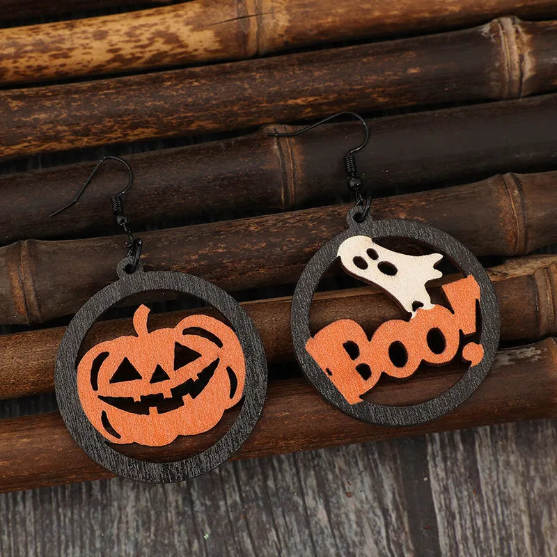 Hollow pumpkin and "Boo!" letter wooden earrings.