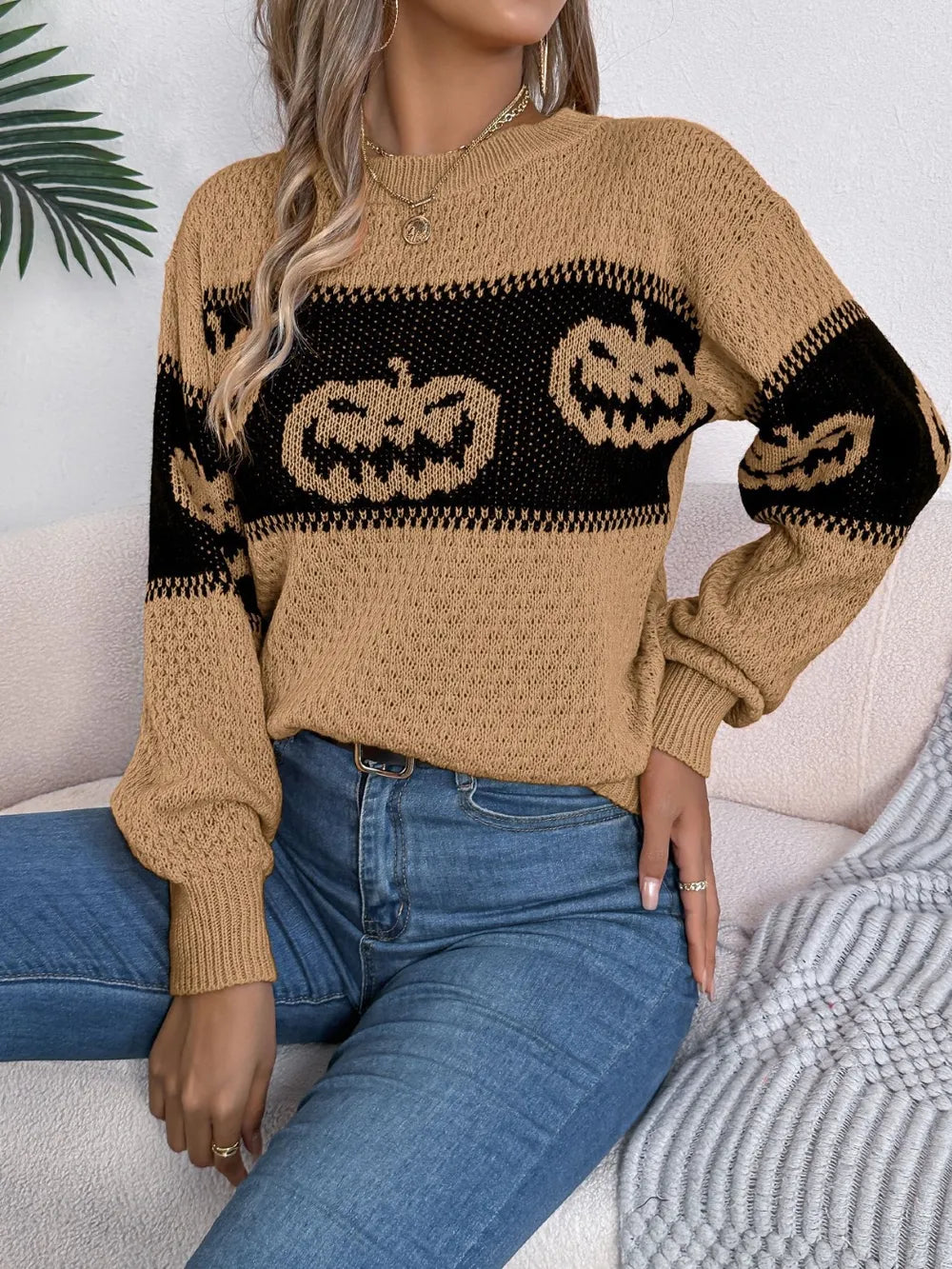 Pumpkin round neck long sleeve sweater.