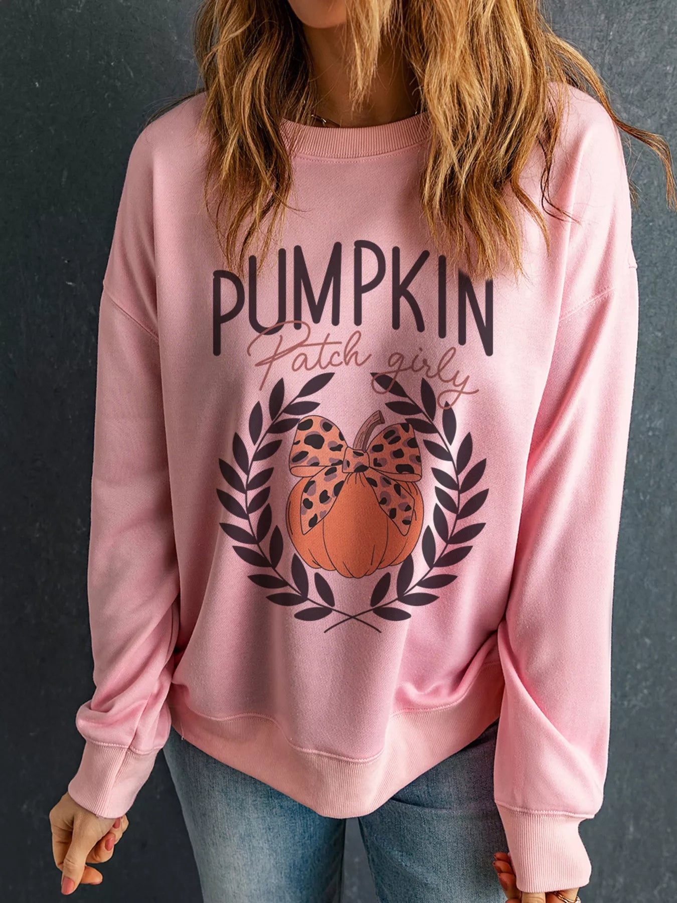 Pink Halloween Leopard Bowknot Pumpkin Graphic Sweatshirt.