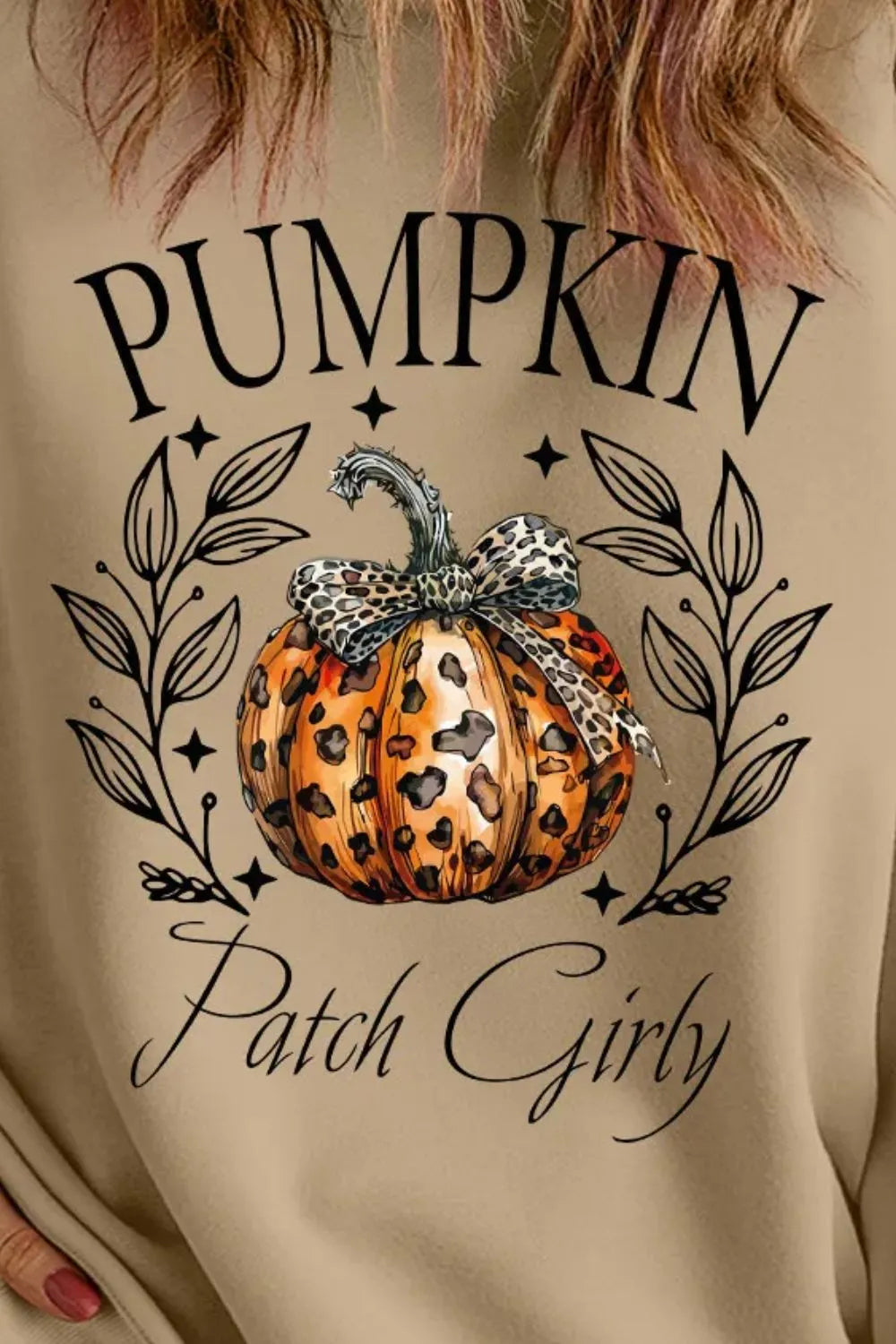 Plus size pumpkin graphic long sleeve sweatshirt with "Pumpkin Patch Girly" text.