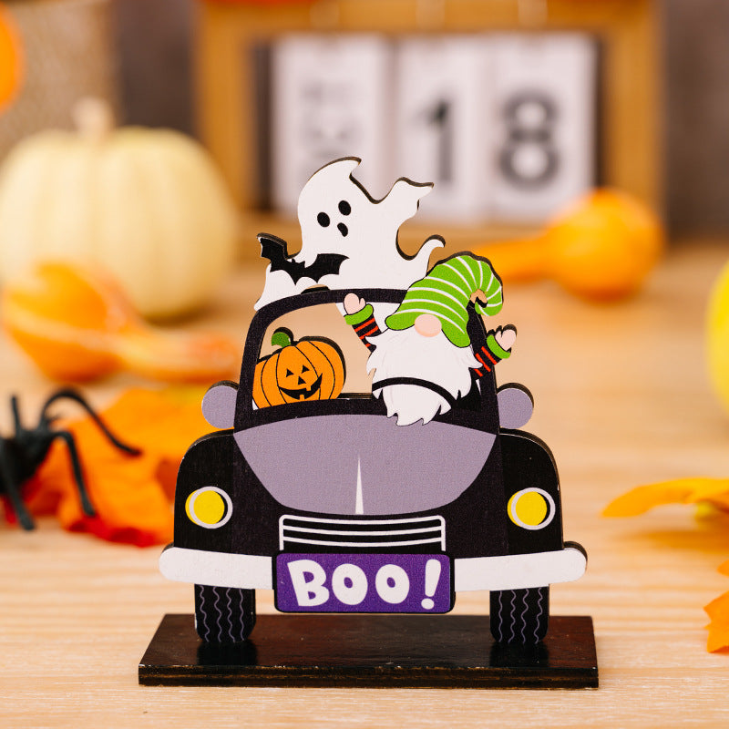 A 3-piece Halloween car-shaped ornament set featuring a ghost, gnome, and pumpkin.