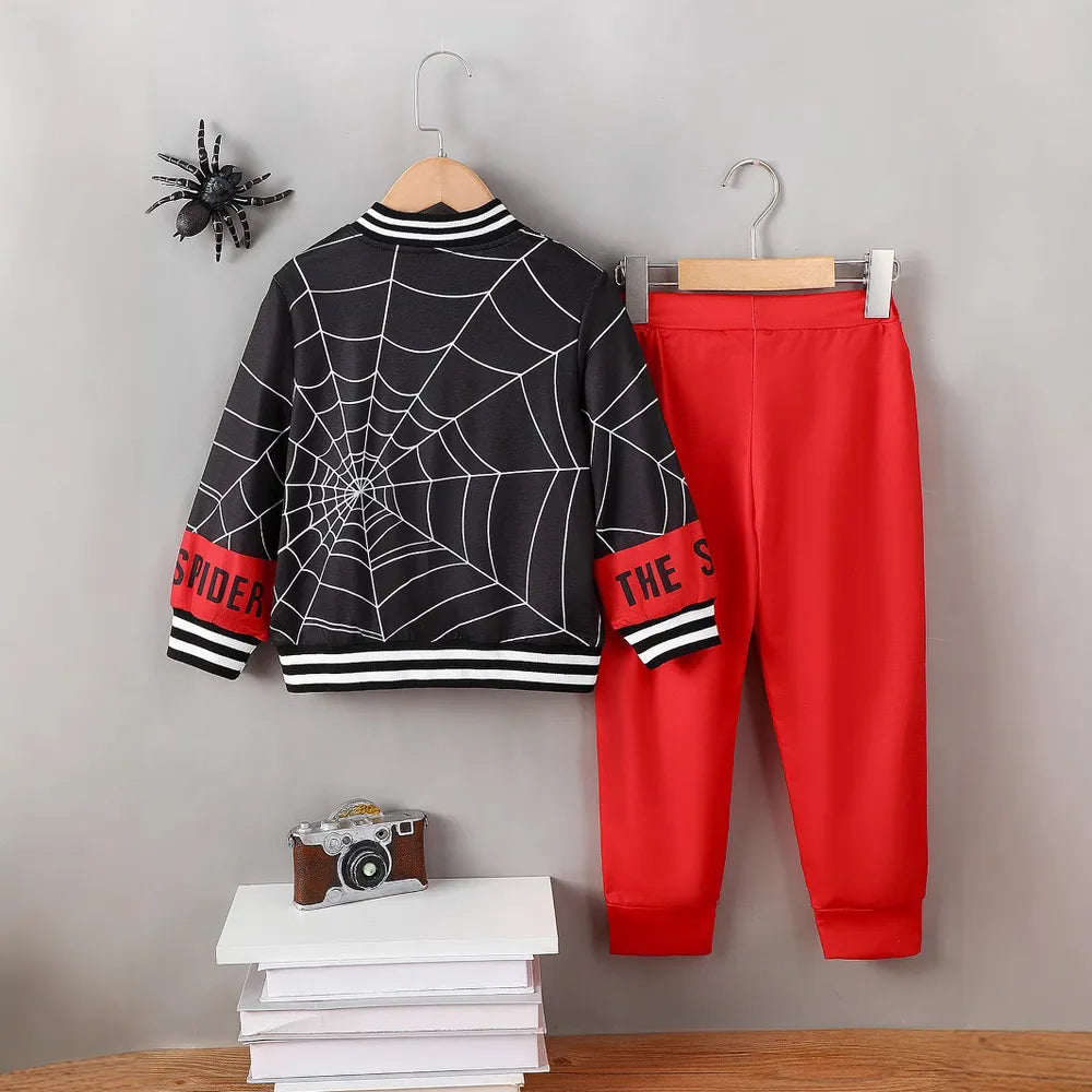 Black spiderweb baseball collar top with red sleeves and matching red pants.
