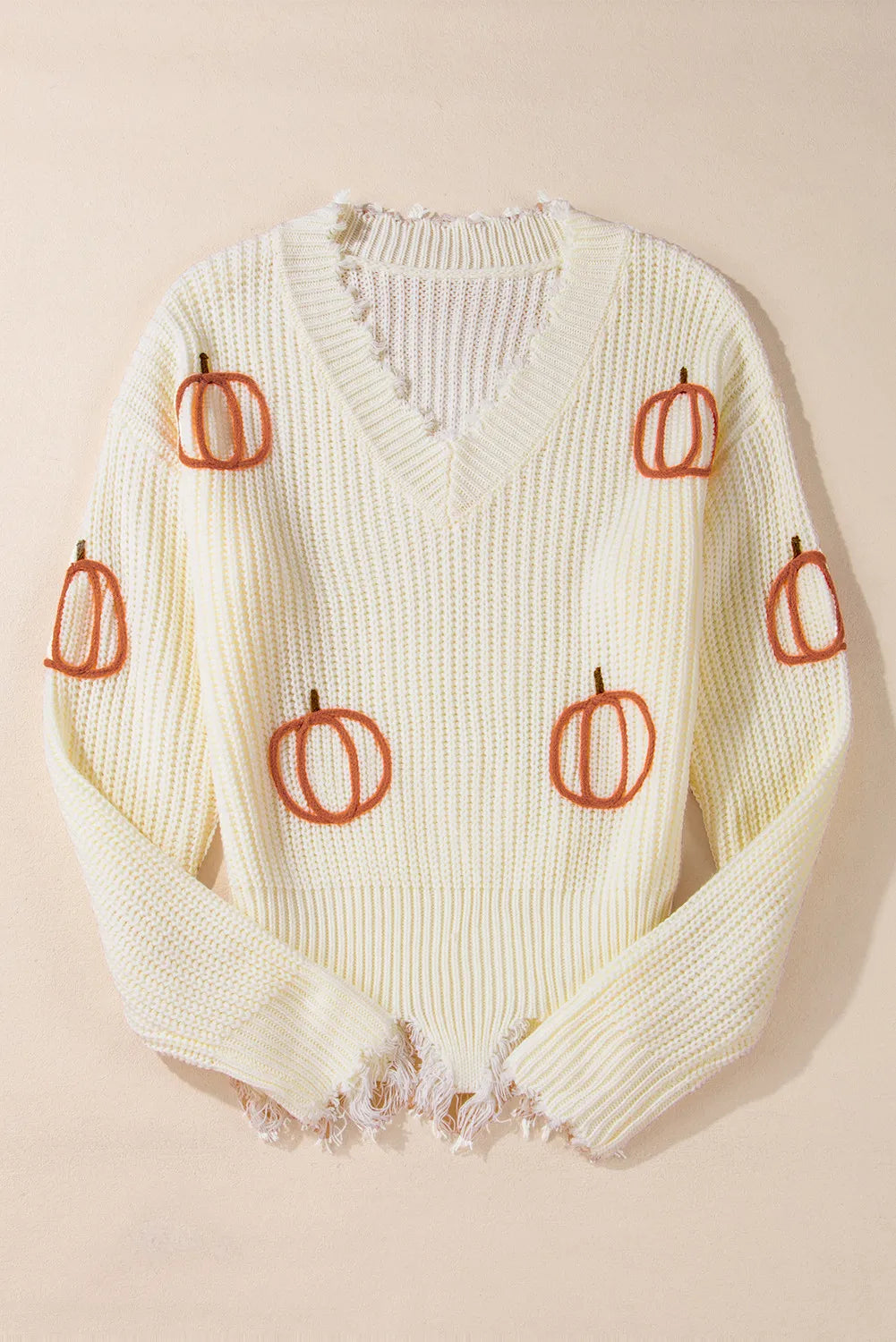 Raw hem pumpkin V-neck long sleeve sweater.