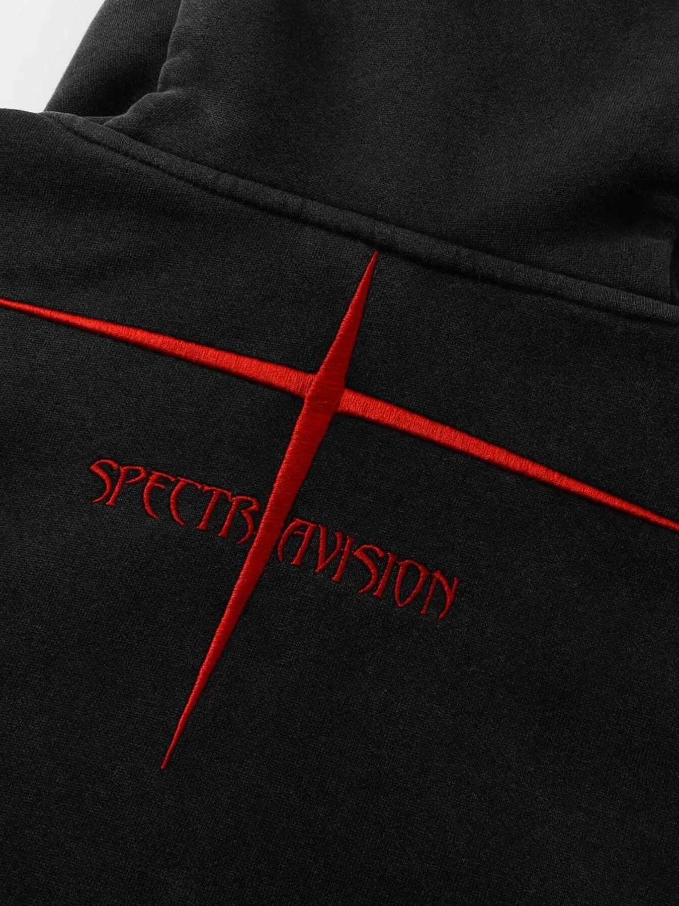 Black hoodie with red embroidered "SPECTRAVISION" text and a red cross design.