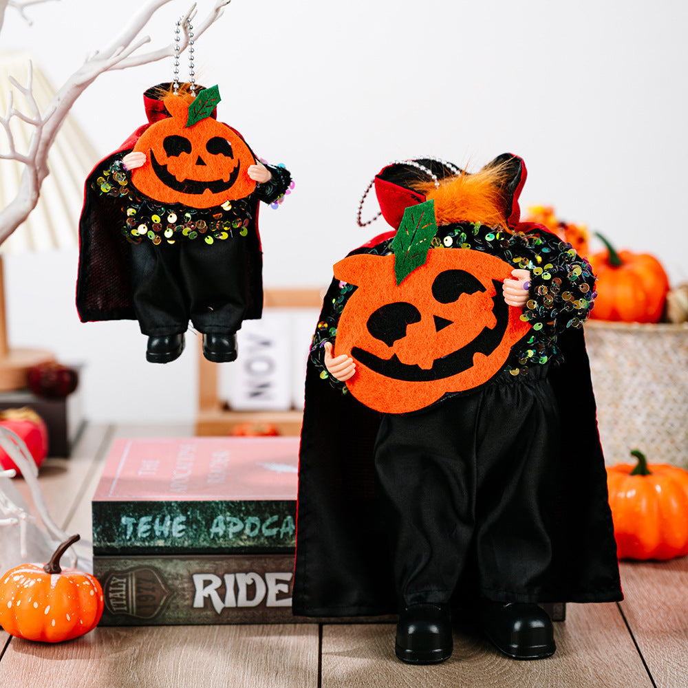 Two sequin Halloween hanging widgets, one large and one small, hold pumpkin cutouts.