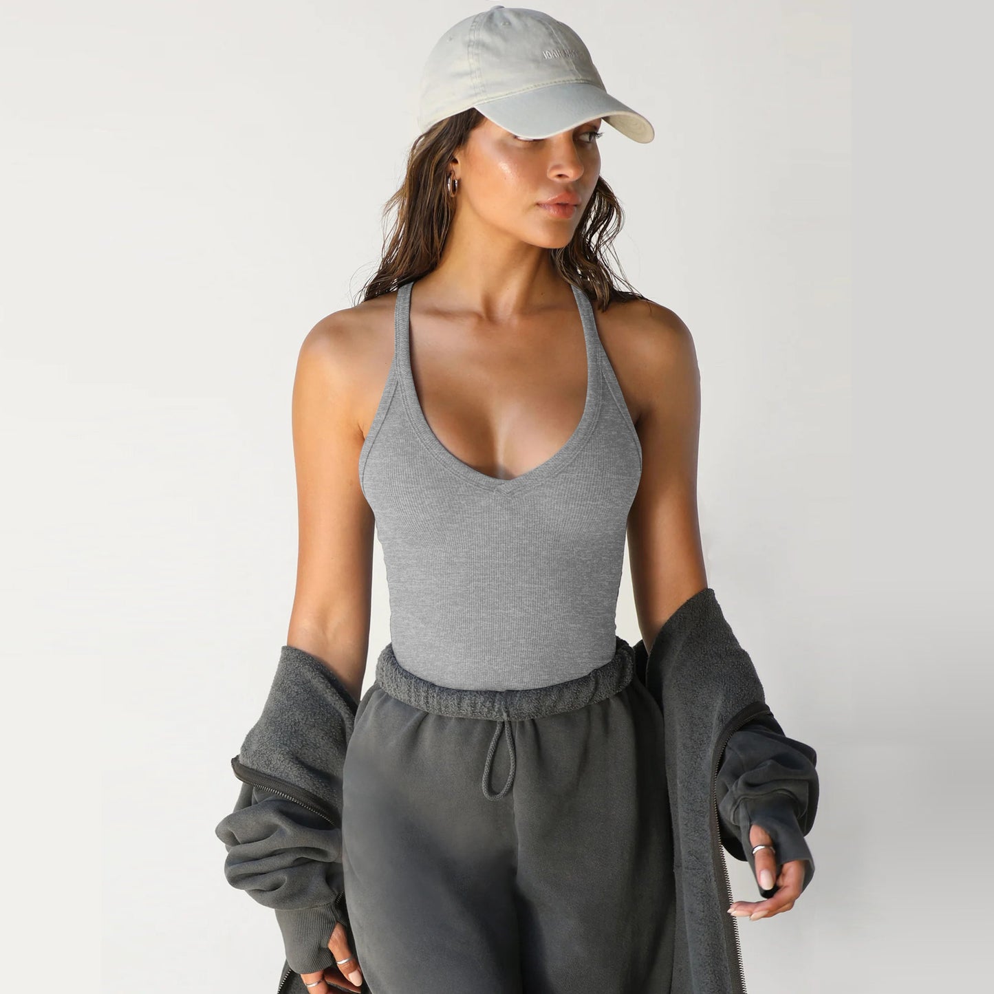 A knitted vest top is paired with a base layer