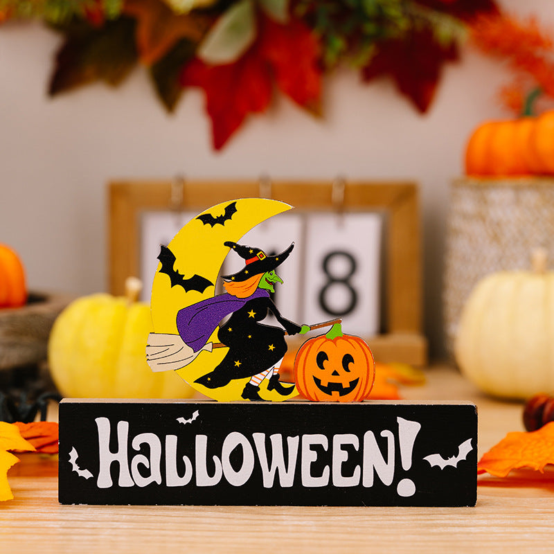 A witch on a broomstick flying past a crescent moon, with "Halloween!" written below.