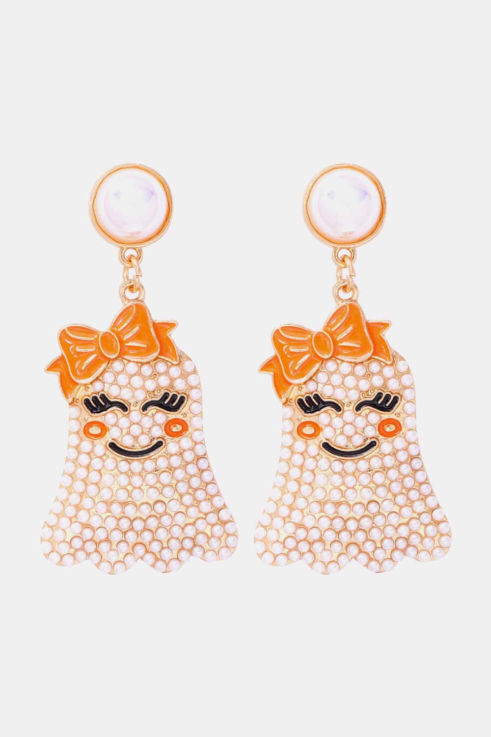 Smiling ghost shape synthetic pearl earrings with orange bows.