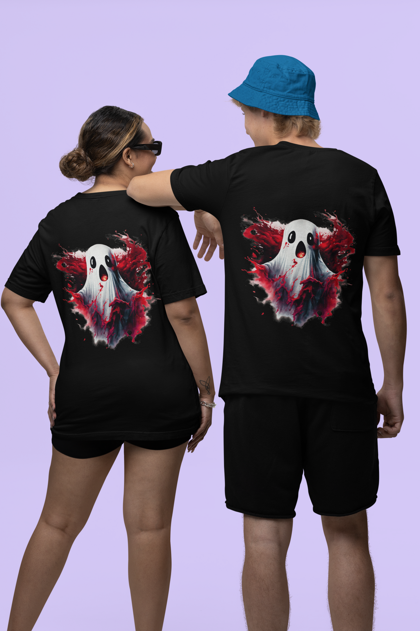 Two people wear black t-shirts with a creepy ghost design on the back.
