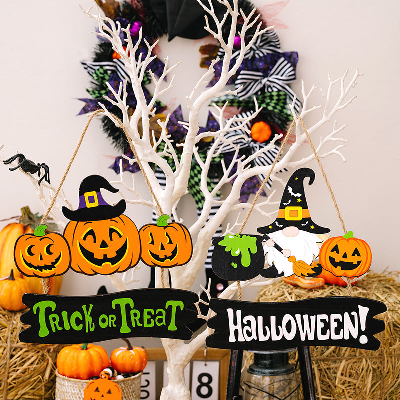 Halloween Trick or Treat hanging widget with pumpkins, a witch gnome, and a cauldron.