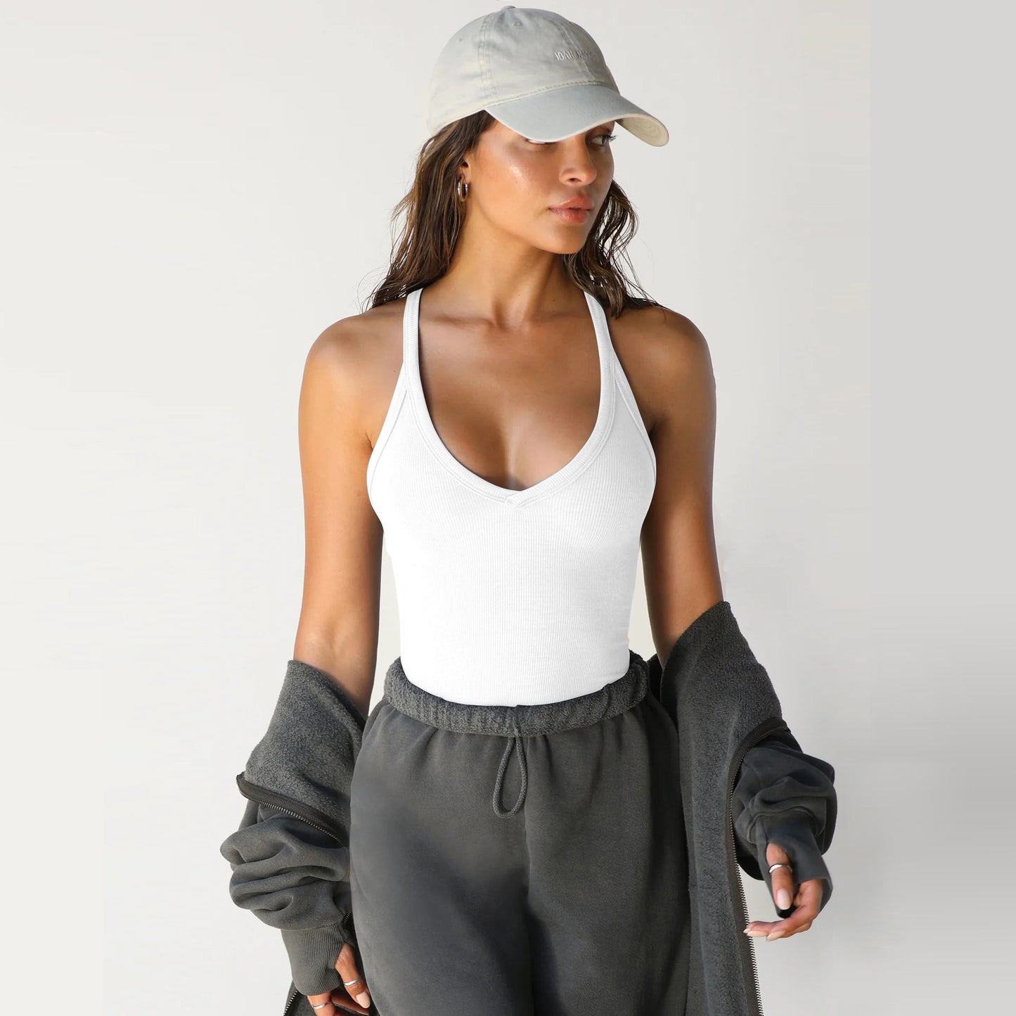 A knitted vest top is paired with a base layer