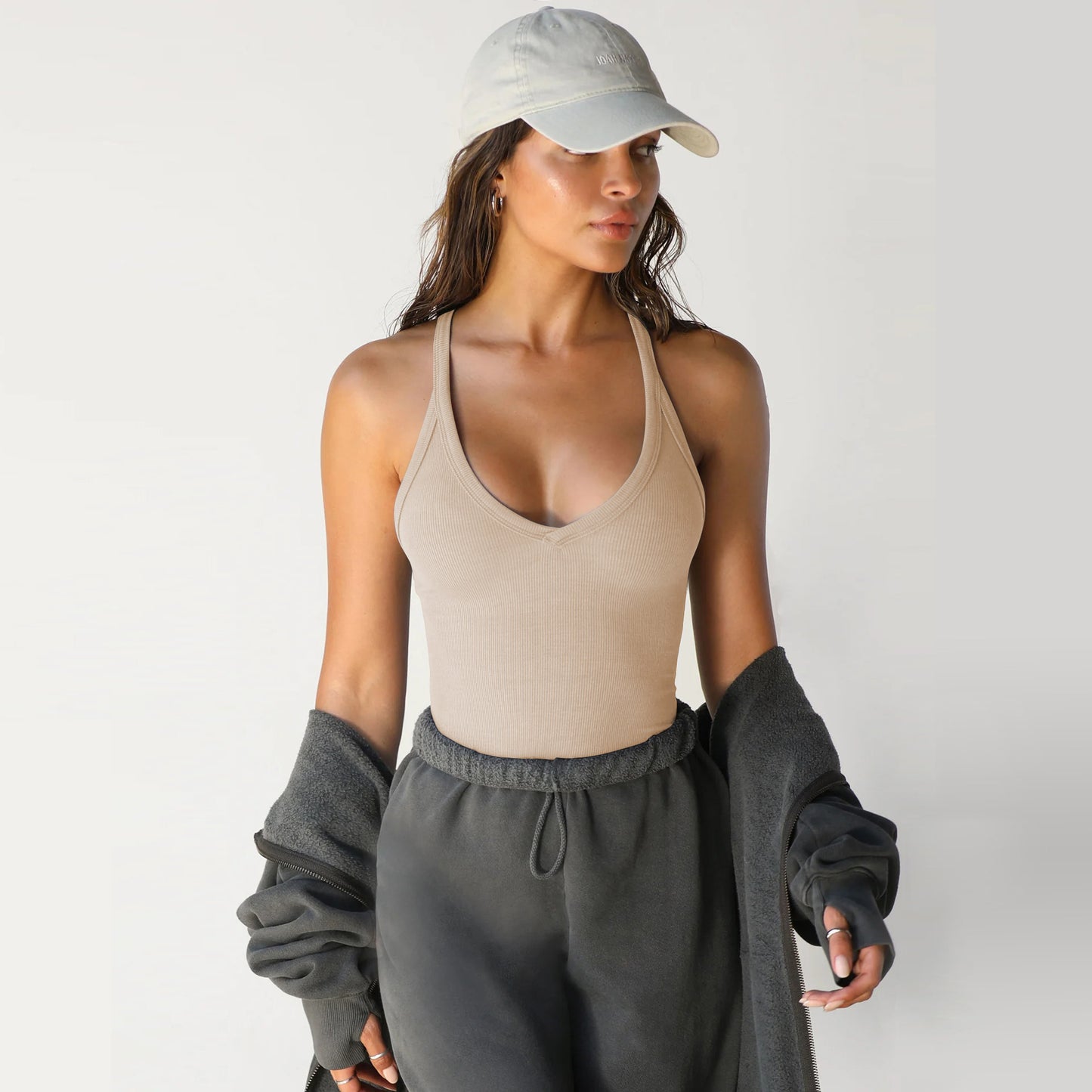 A knitted vest top is paired with a base layer