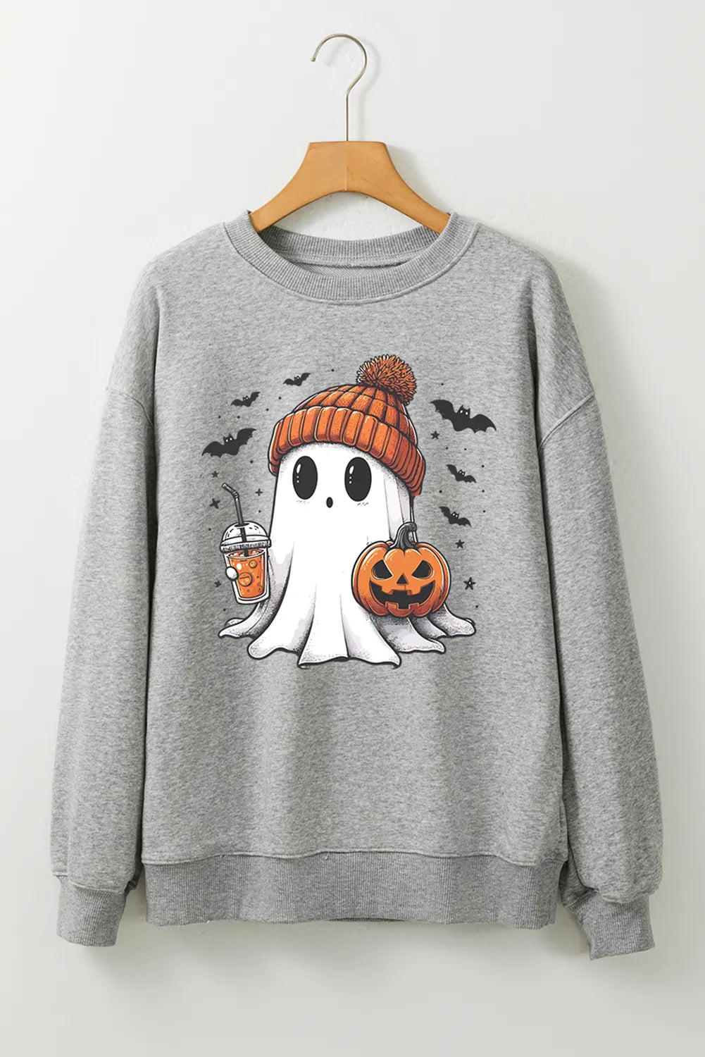 Gray long-sleeve sweatshirt with a ghost wearing a beanie, holding a drink and pumpkin.