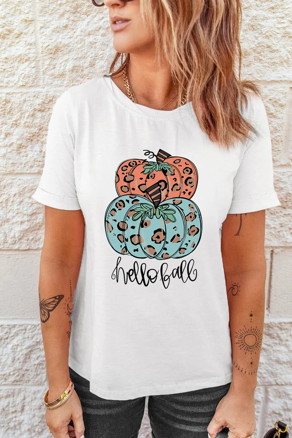 Pumpkin Graphic Short Sleeve T-Shirt with "hello fall" text.