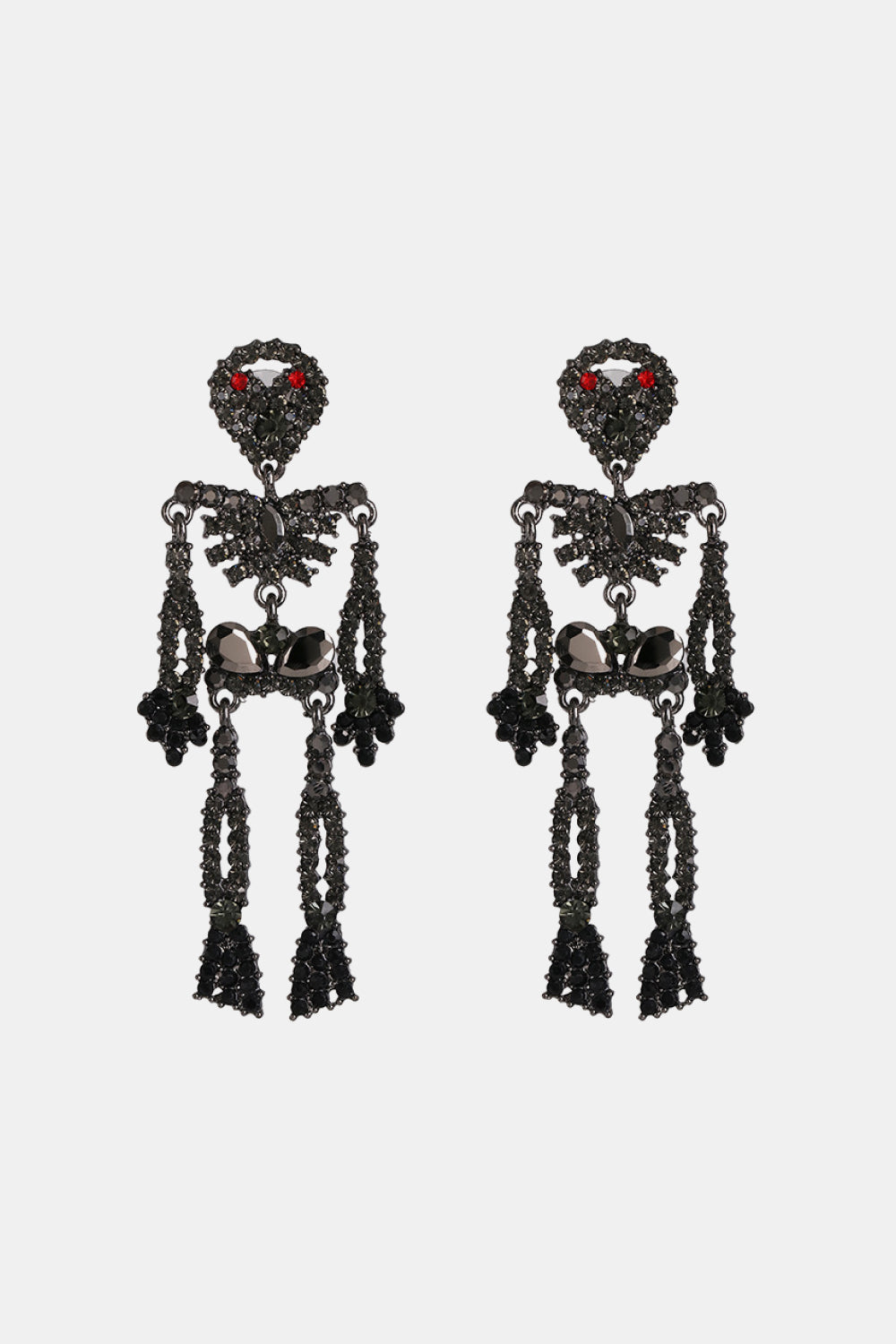 Two black skeleton-shaped dangle earrings with red and black glass stones.
