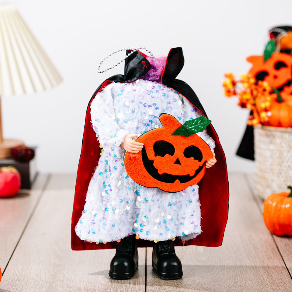 Two-piece sequin Halloween hanging widgets, one a vampire doll holding a pumpkin.