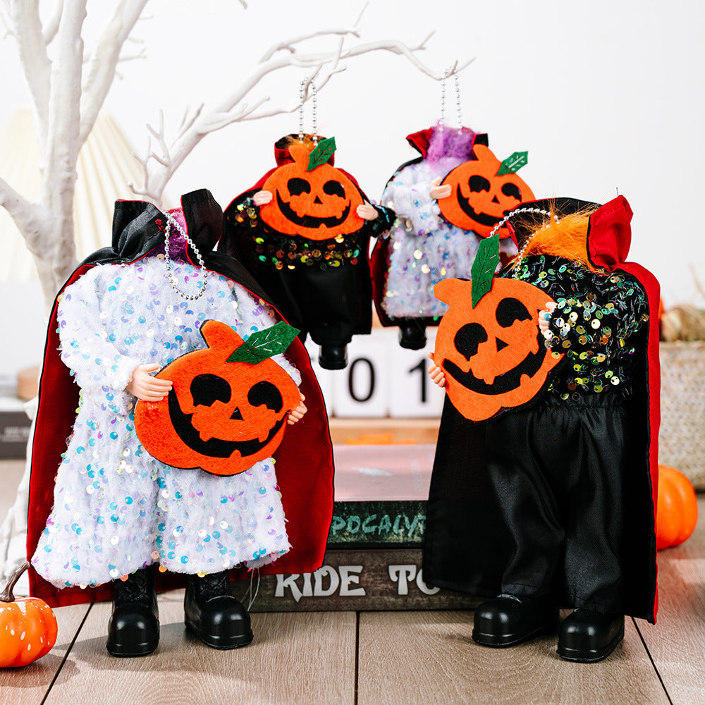 Two sequin Halloween hanging widgets, one white and one black, hold orange pumpkins.