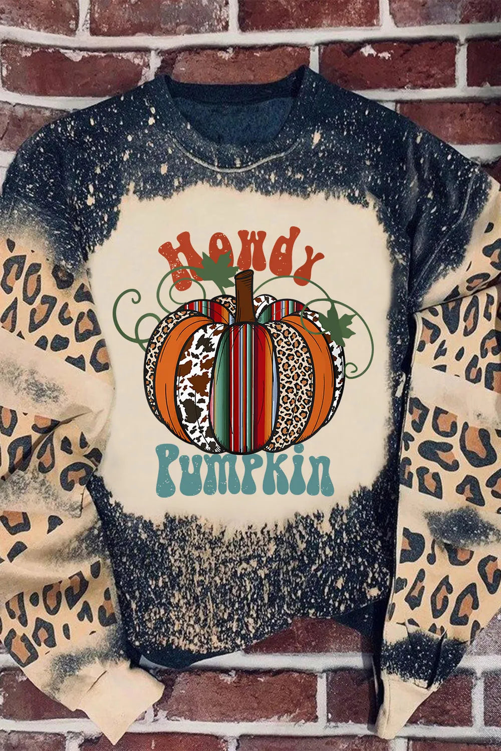 Bleached black and tan leopard print sweatshirt with a "Howdy Pumpkin" graphic.