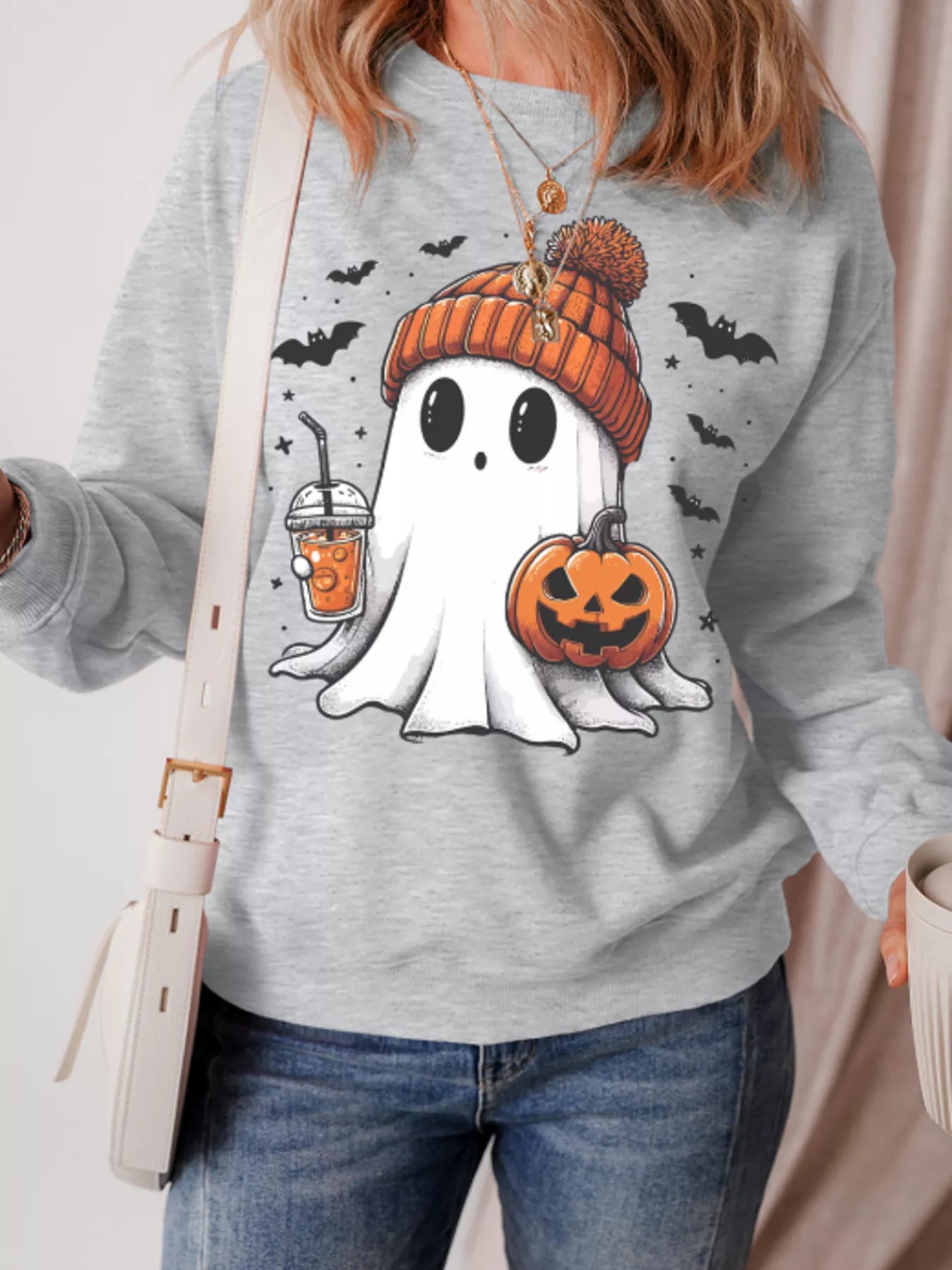 Halloween Ghost Round Neck Sweatshirt with a ghost, pumpkin, and bats graphic.