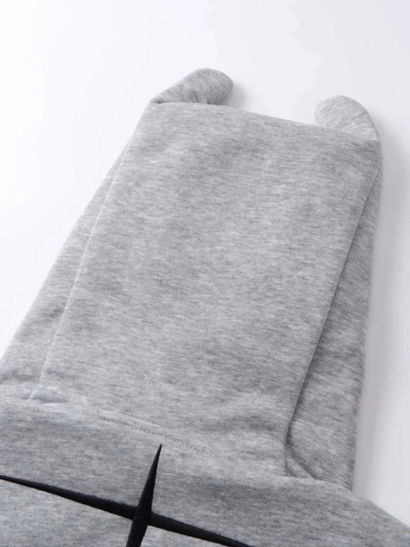 Gray men's zip-up hoodie with devil horns and a black cross design.
