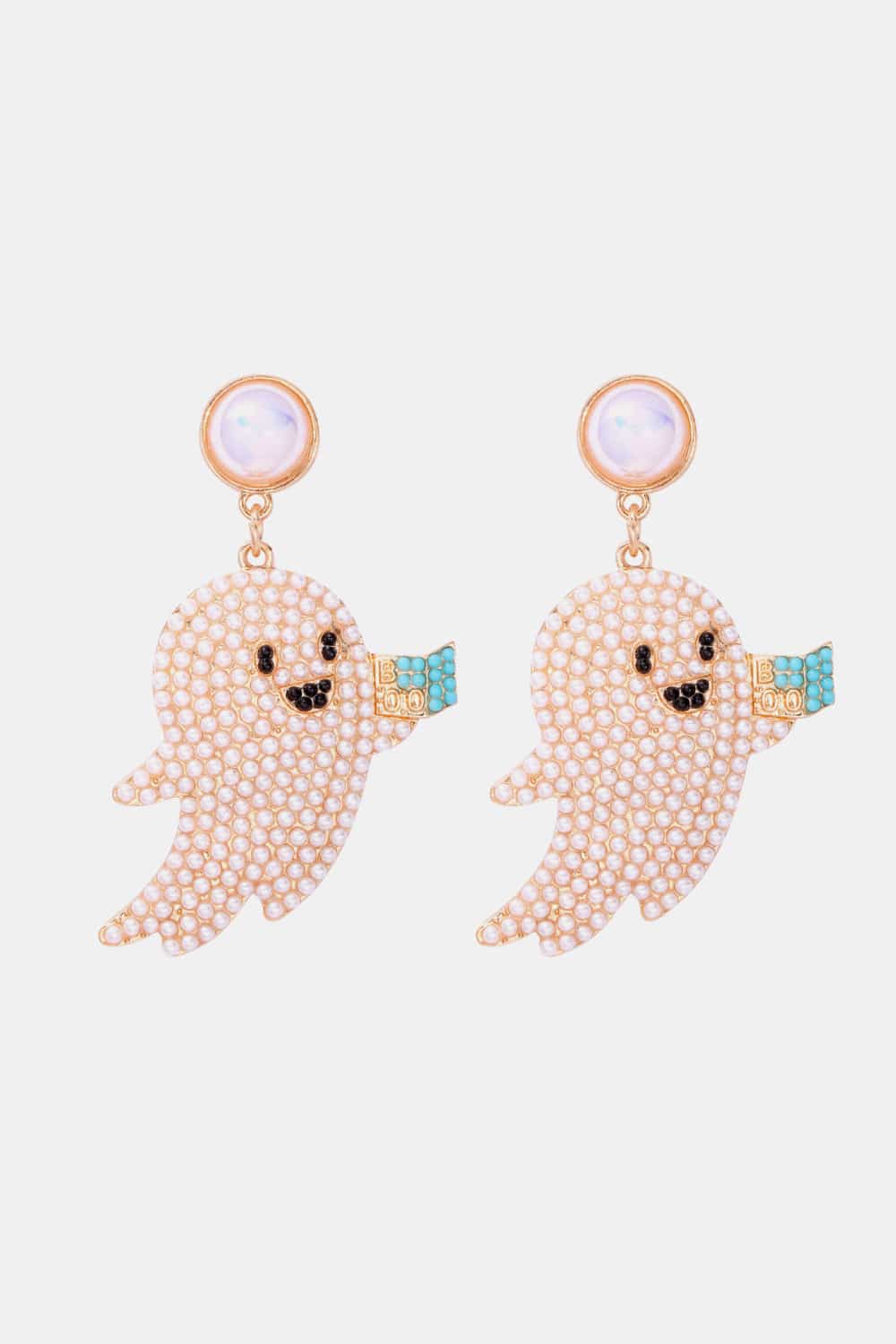 Two ghost-shaped dangle earrings adorned with synthetic pearls, each holding a turquoise "BOO" sign.