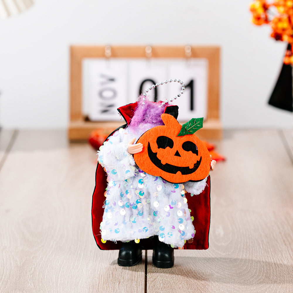 Two-piece sequin Halloween hanging widgets featuring a vampire holding a pumpkin.