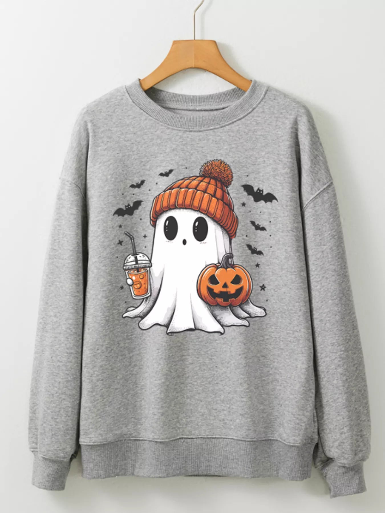 Gray sweatshirt with a ghost wearing a beanie, holding a drink and a pumpkin.