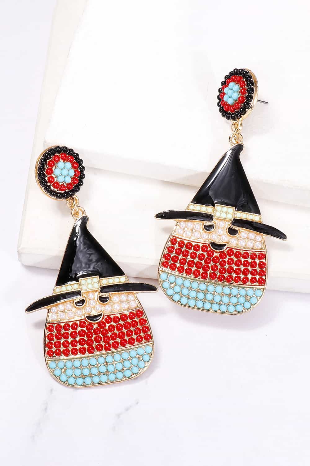 Pair of witch's hat-shaped dangle earrings with red, white, and blue synthetic pearls.