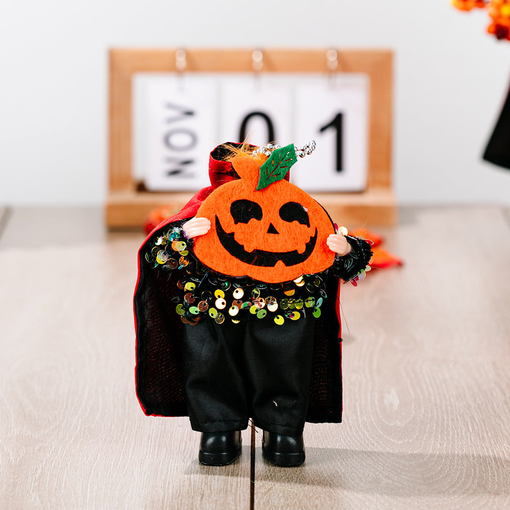 A two-piece sequin Halloween hanging widget with a pumpkin head and black outfit.