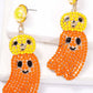 Halloween ghost shape dangle earrings with yellow and orange beads.