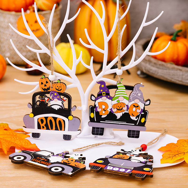 Four wooden Halloween car-shaped hanging ornaments featuring gnomes and pumpkins.