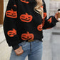 Fuzzy pumpkin round neck dropped shoulder sweater with a woman wearing it.