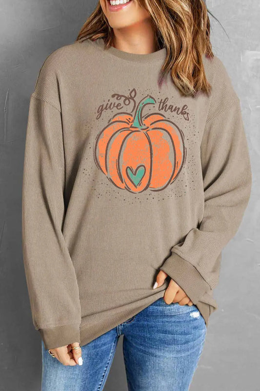 Pumpkin graphic round neck long sleeve sweatshirt.
