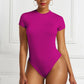 A base layer for a shaping garment