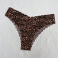 Printed base with wave-shaped edges and triangular-shaped underwear