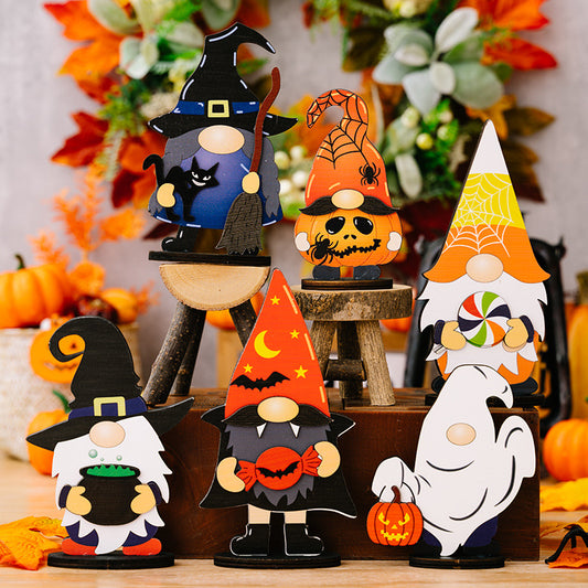 Six wooden Halloween gnome and ghost ornaments are displayed.