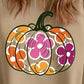 Plus size pumpkin graphic dropped shoulder sweatshirt with floral design.