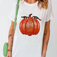 White short-sleeve t-shirt with a sequin pumpkin design.