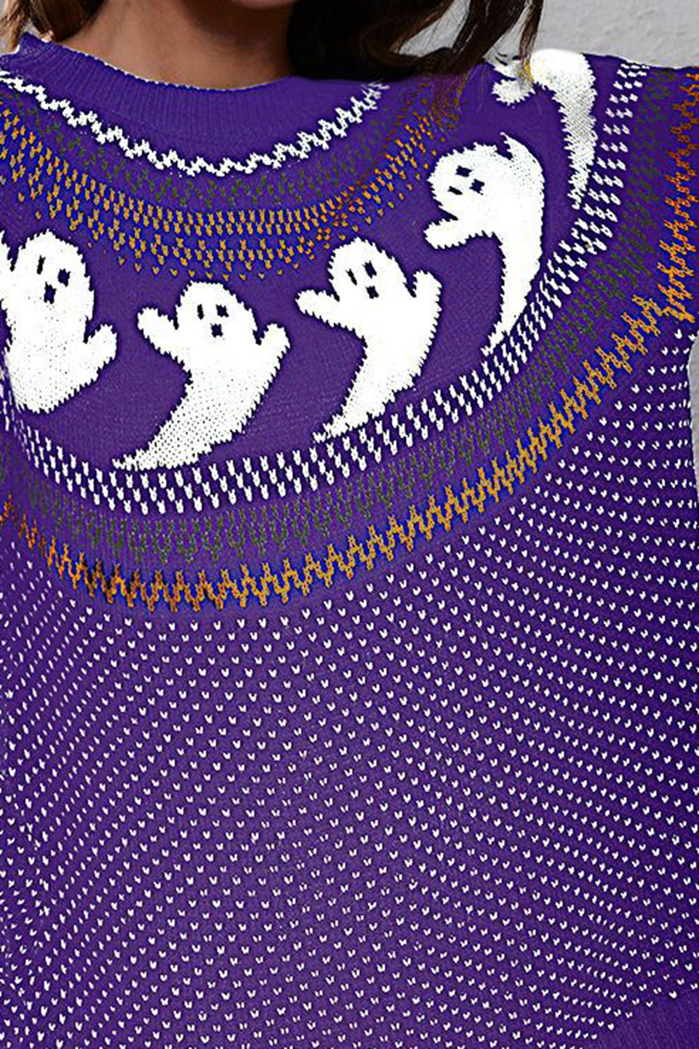 Purple long-sleeve sweater with a round neck and white ghost pattern.