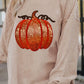 Sequin pumpkin round neck long sleeve sweatshirt.