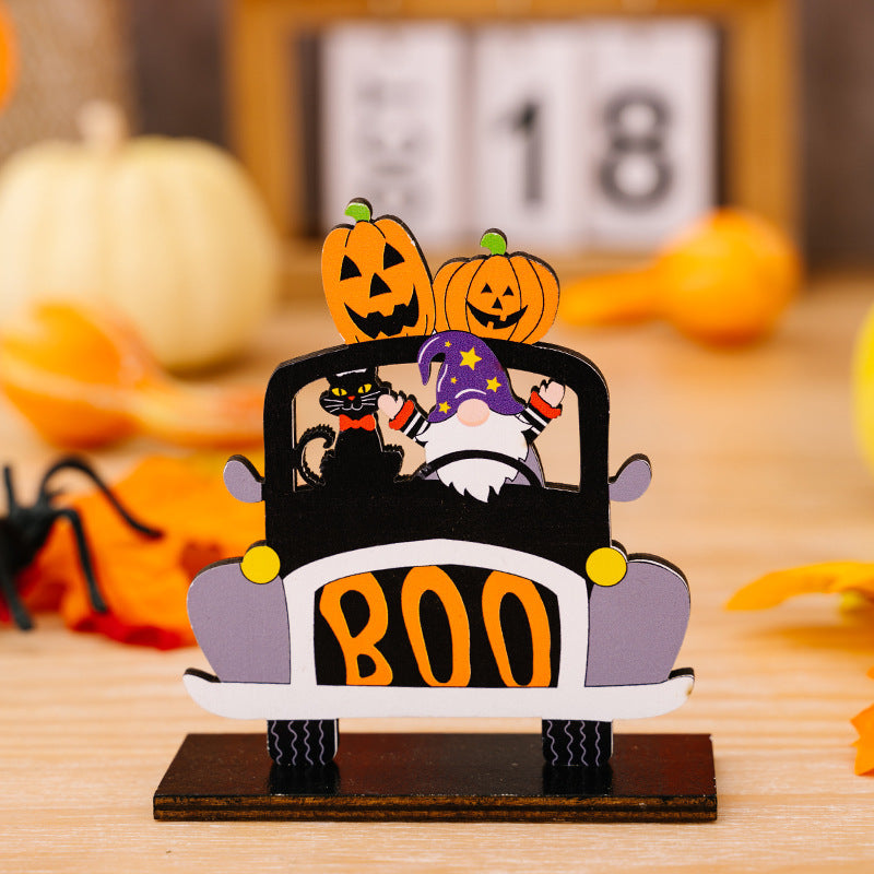 Three-piece Halloween car-shaped ornament set with a gnome, cat, and pumpkins.