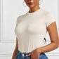 A base layer for a shaping garment