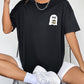 Black short sleeve t-shirt with a ghost holding a coffee cup graphic.