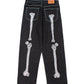 Men's black straight leg jeans with white skeleton bone embroidery on the back.