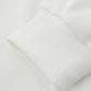 Close-up of a white ribbed cuff on a Men's Spider Graphic Oversized Hoodie.
